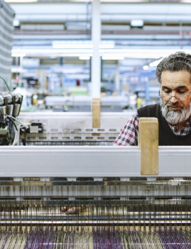 Male factory worker on weaving machine in woollen mill  Home 08 male factory worker on weaving machine in woollen 2025 04 05 06 53 11 utc 1 scaled 613x800